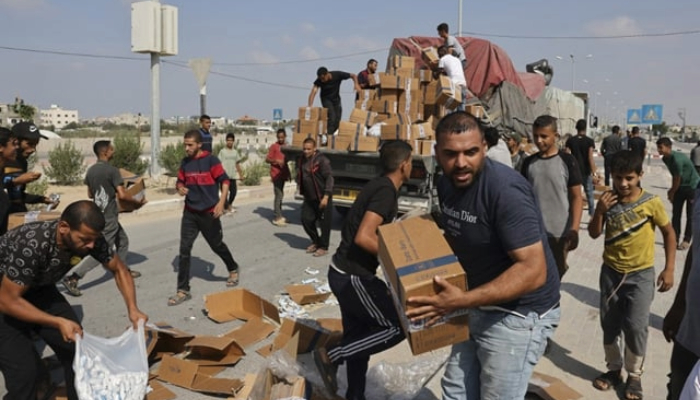 Aid efforts ‘nearly impossible’ as Israel slams Gaza