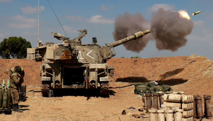 Israeli military amasses troops near Gaza, sparking fears of ground invasion