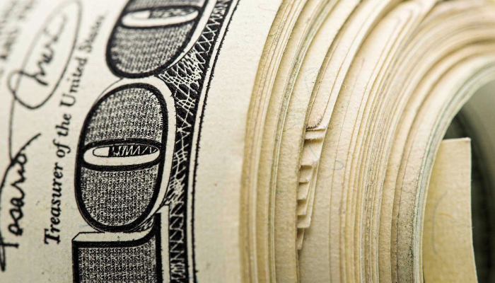 Aligning salaries with the dollar pact: A win-win for companies and employees?