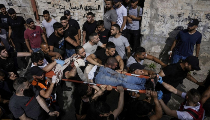 Israeli forces kill 3 Palestinians, run over body